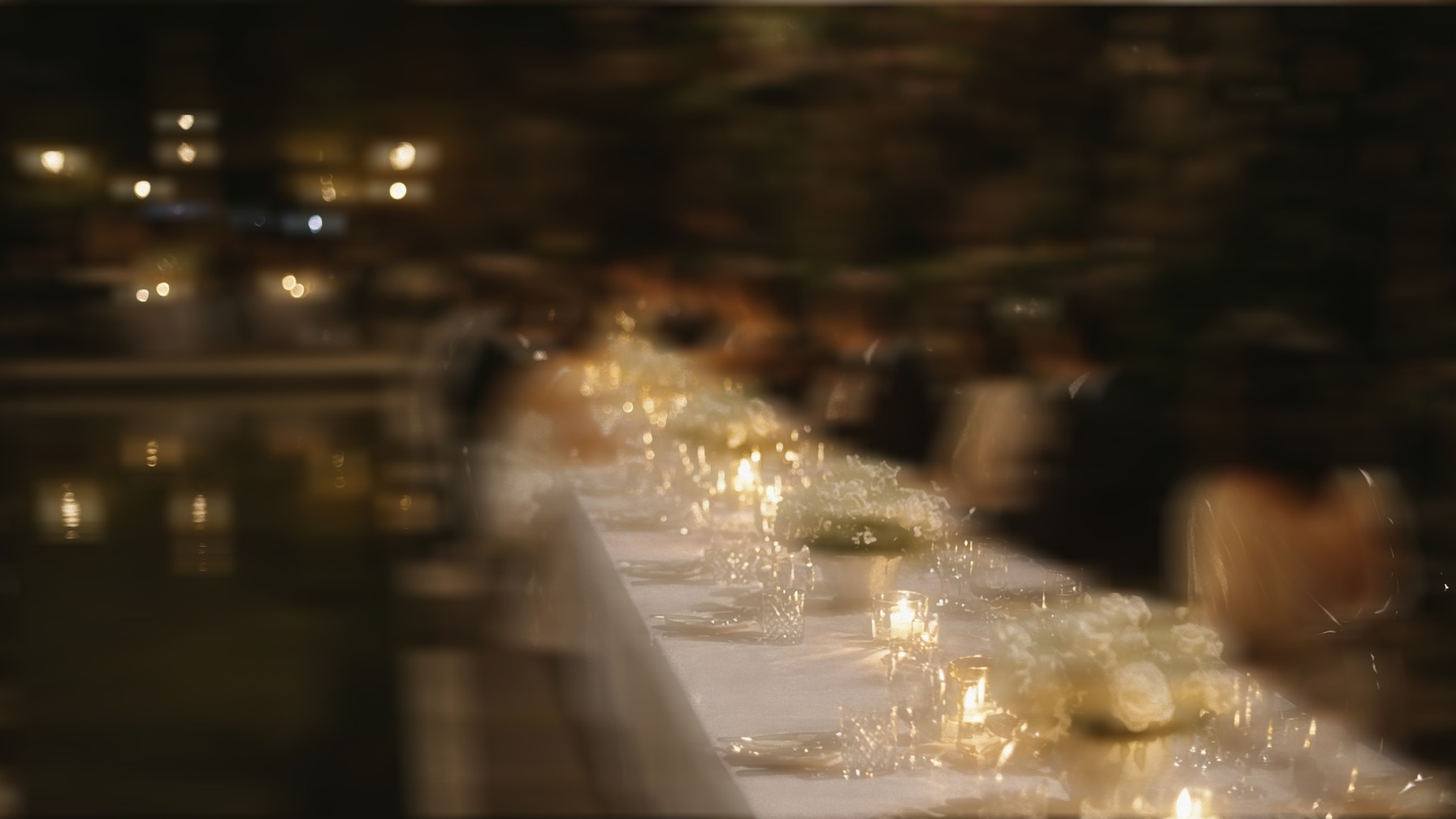 A candlelit dinner in motion. The table is still. The guests are not.